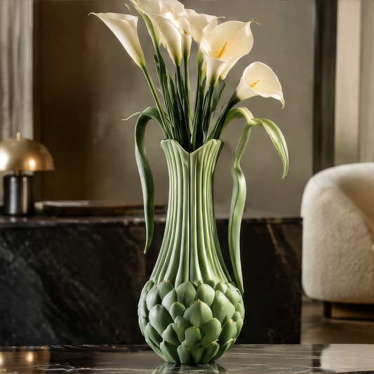 Timeless Beauty — sage green artichoke ceramic vase with calla lilies on black marble in luxury dark interior setting