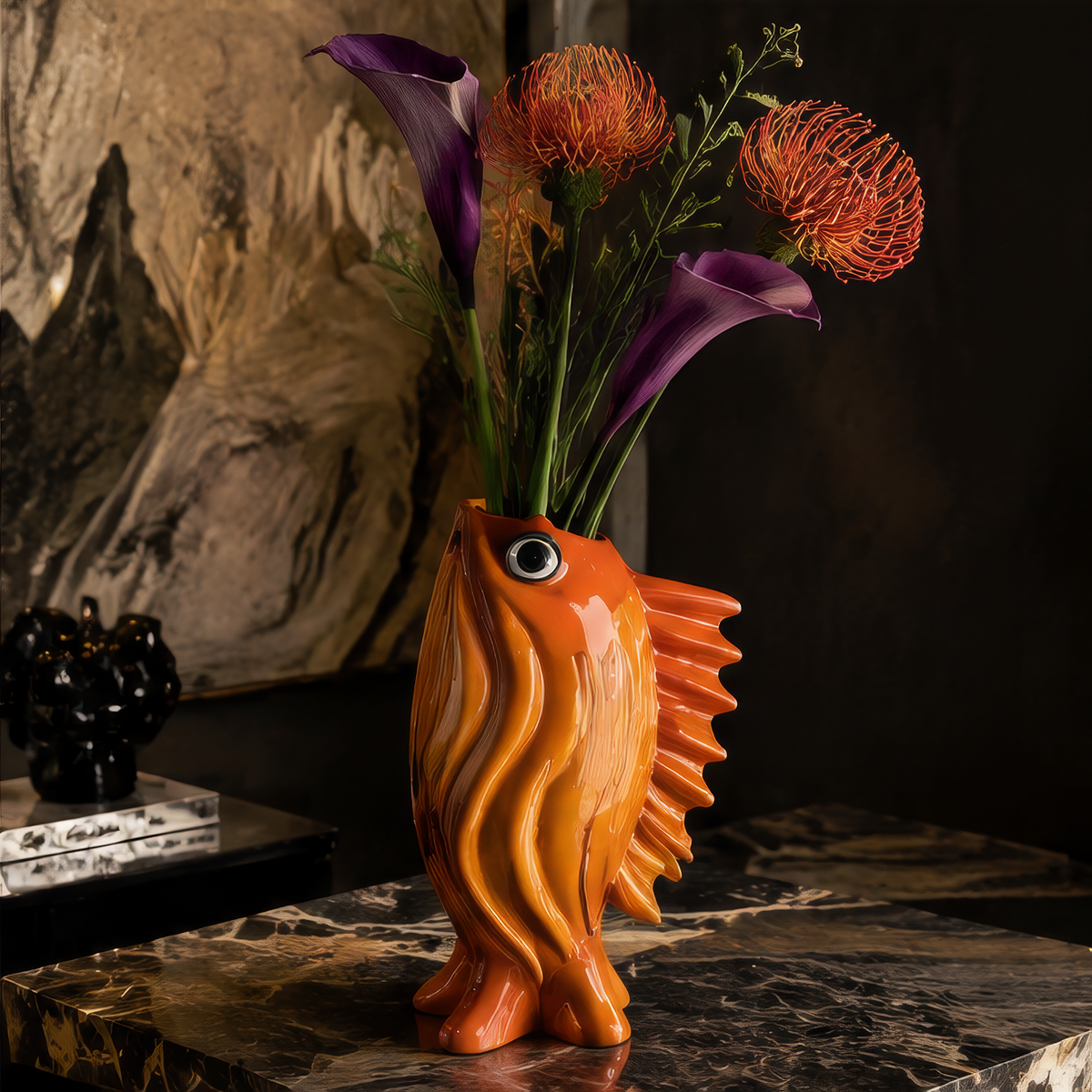 Stable Elegant Base — bottom view of orange goldfish vase showing four rubberized feet for refined home experience