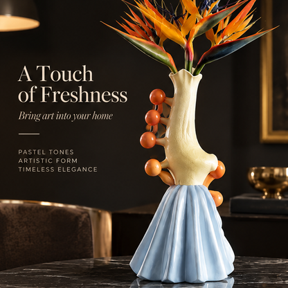 Fresh Macaron Palette — overhead view of pleated skirt vase showing cream white, sky blue and terracotta orange color palette